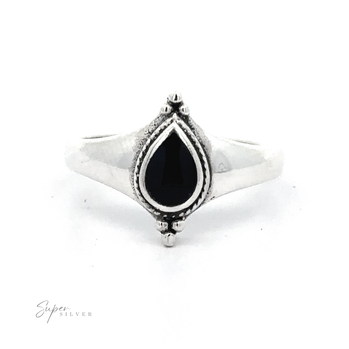 
                  
                    Silver ring with a Teardrop Inlay Shield Ring set in a detailed bezel, crafted as bohemian jewelry.
                  
                
