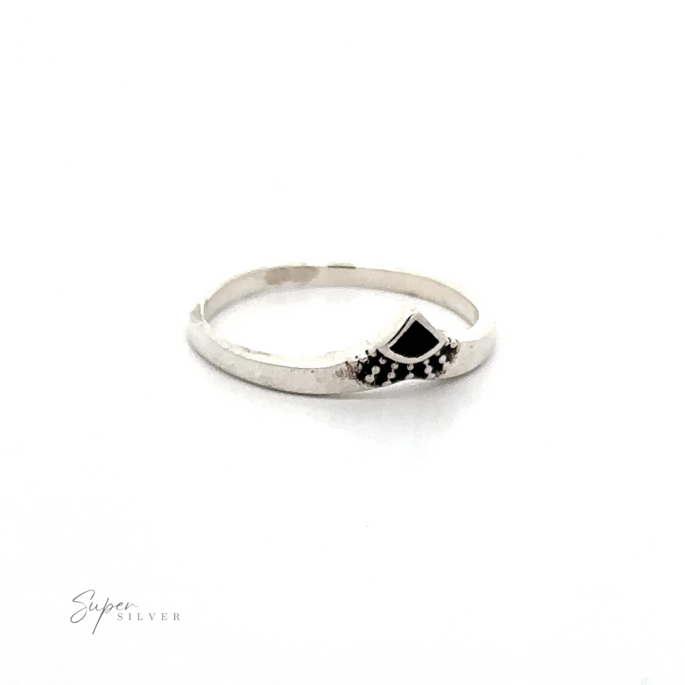 
                  
                    A Dainty Chevron Bali Style Inlay Ring adorned with black and white stones.
                  
                