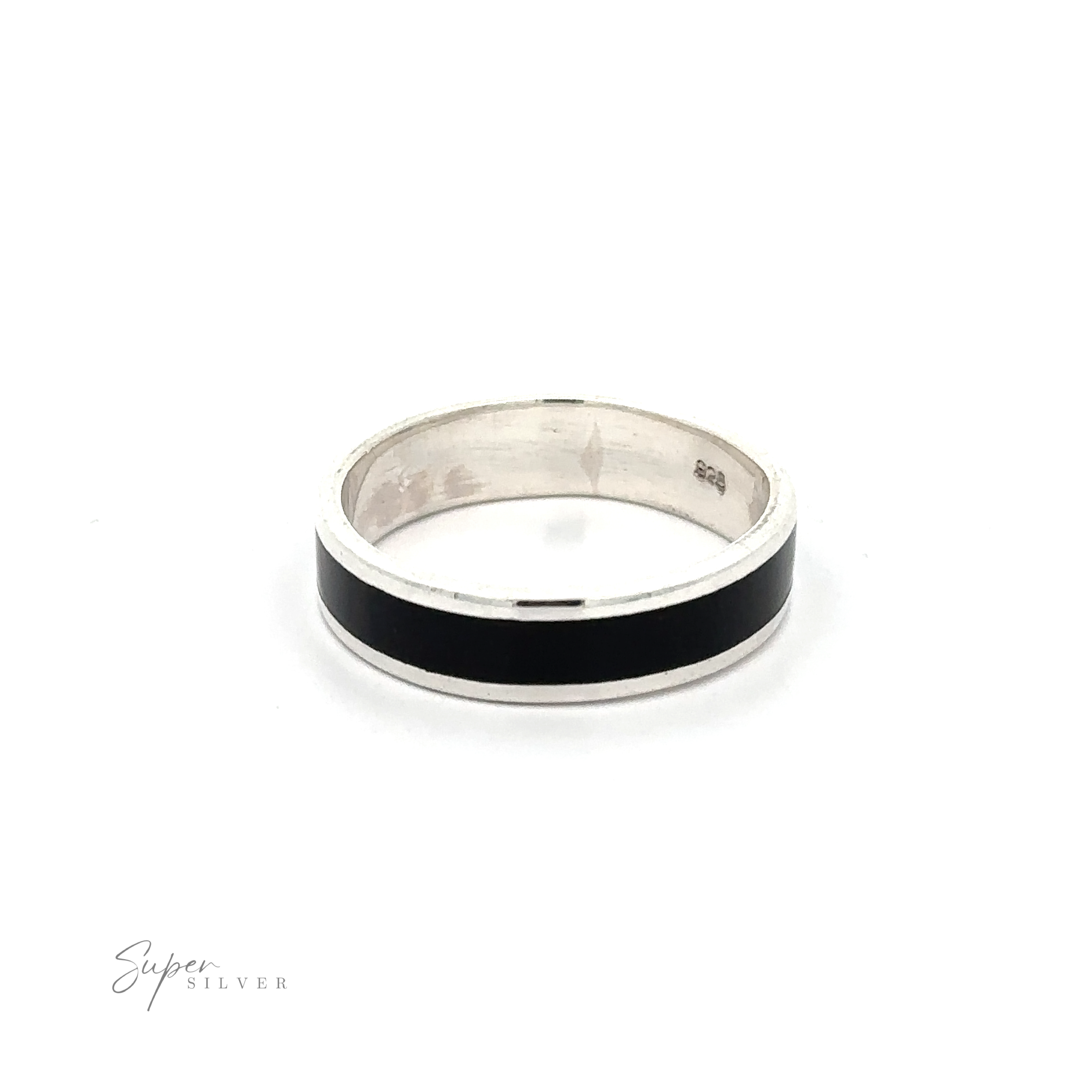 The Simple Inlay Band features a sterling silver ring with a sleek black center band against a white backdrop. This minimalist design embodies elegance and sophistication, with "Super Silver" inscribed at the bottom corner to highlight its charm.