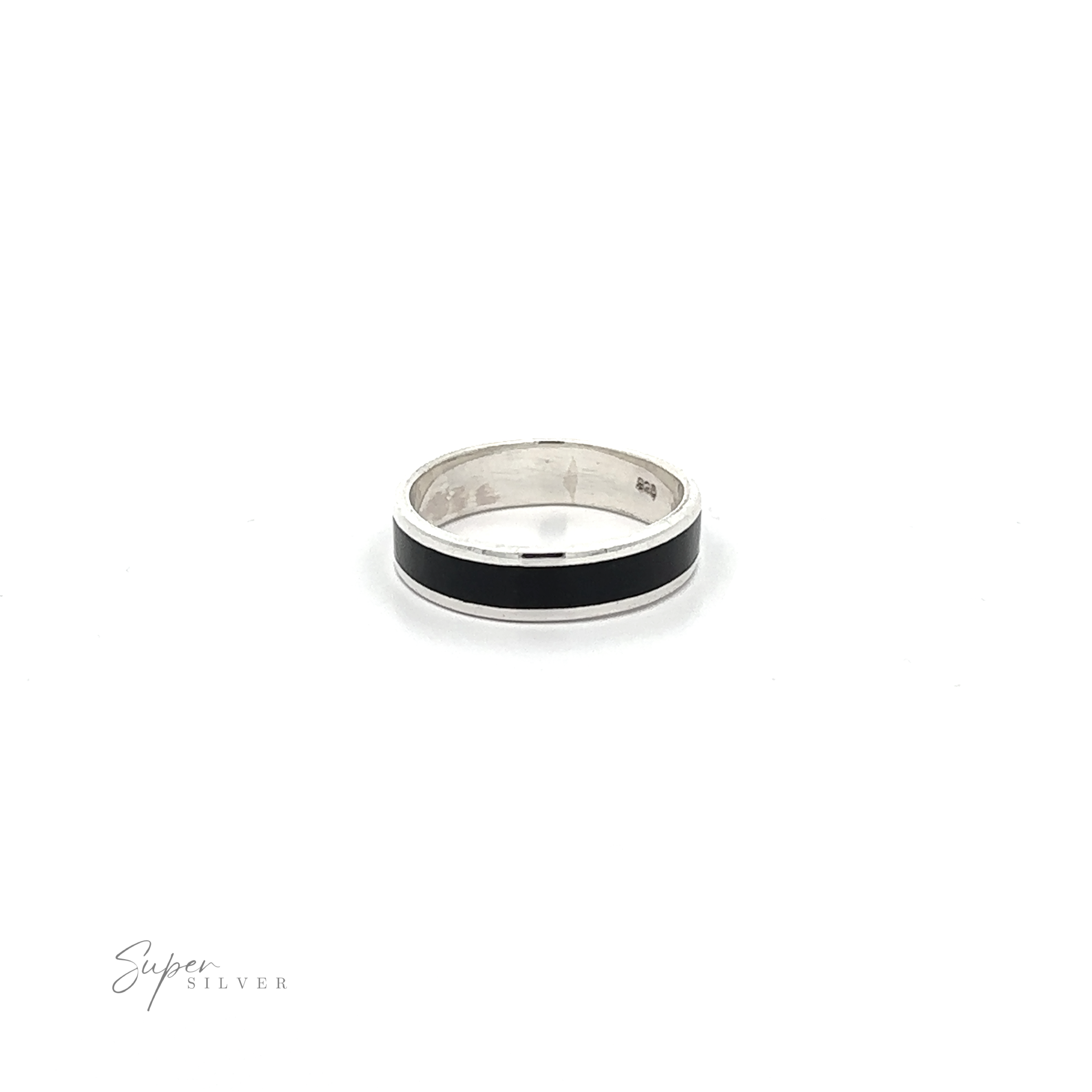 The Simple Inlay Band, a sterling silver ring featuring a black center band, epitomizes minimalist design and is showcased on a white background.