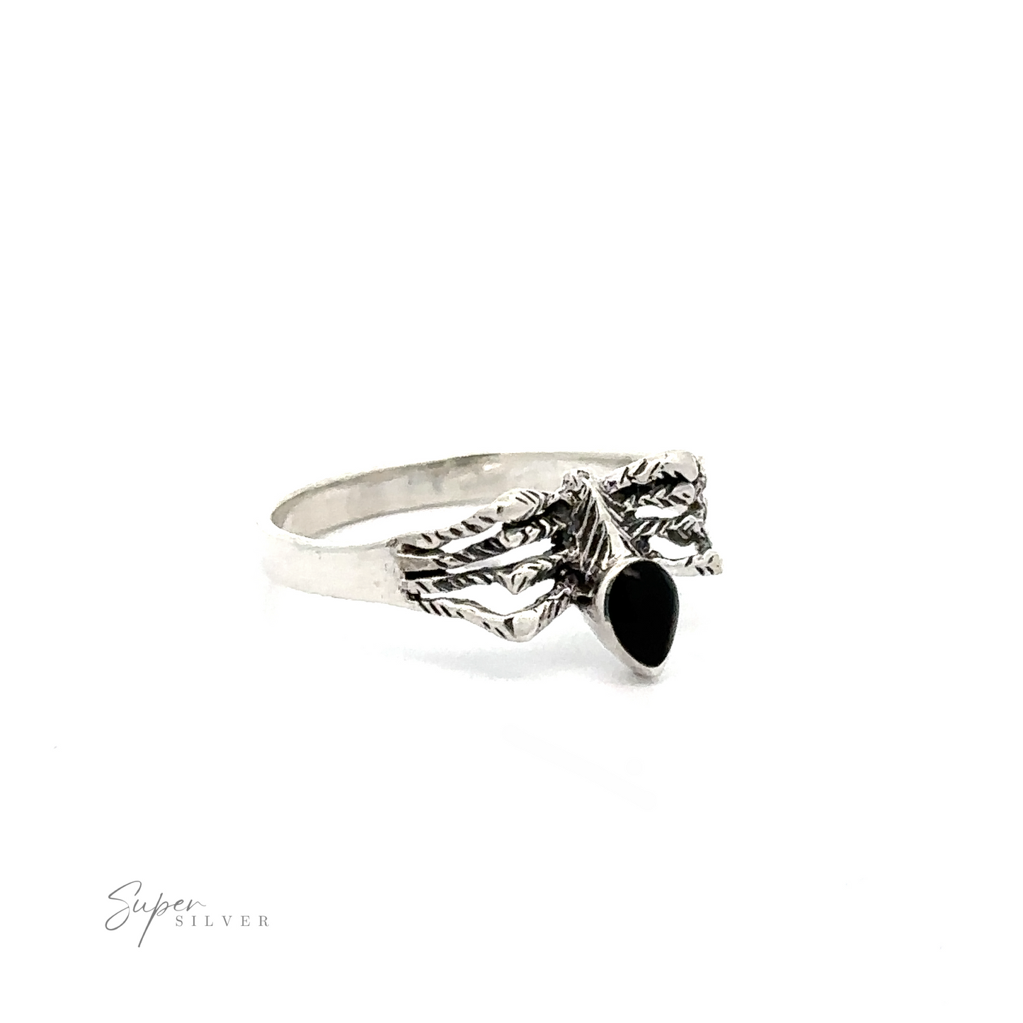 
                  
                    A Small Inlay Spider Ring with a detailed band design and an oval black stone centerpiece set between two textured wings, exuding the allure of mystical jewelry.
                  
                