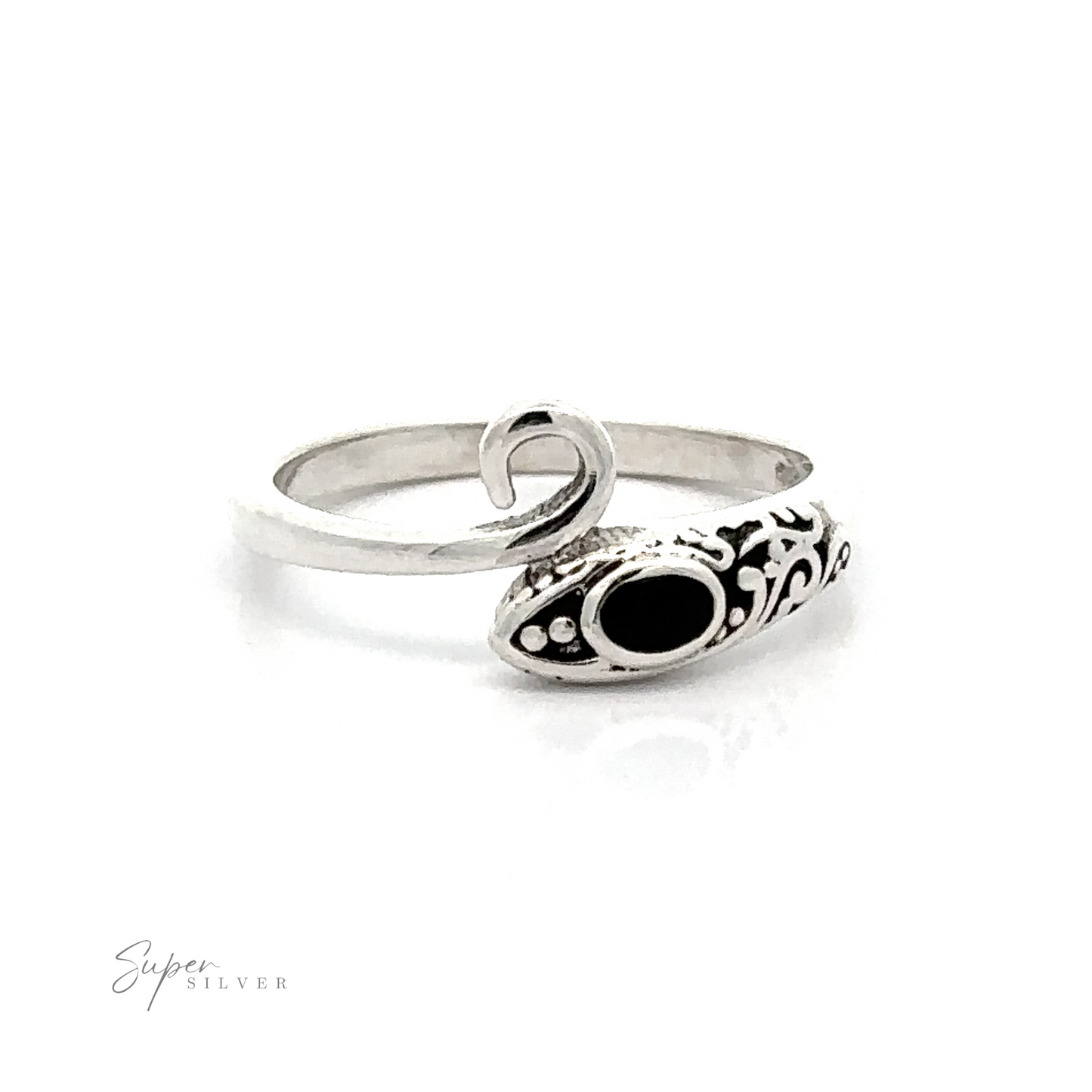 
                  
                    A Inlay Stone Snake Ring With Filigree Design with a black stone and filigree designs.
                  
                
