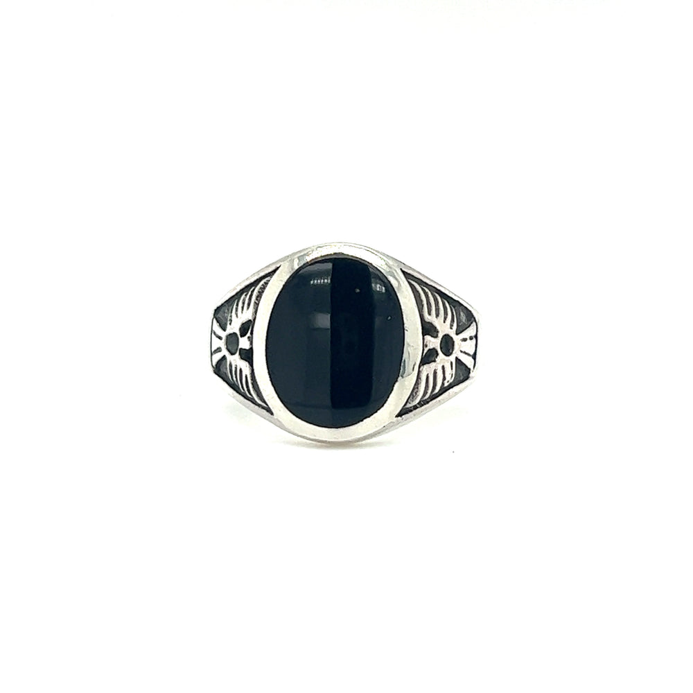 
                  
                    A sterling silver Oval Onyx Ring With Thunderbird Design.
                  
                