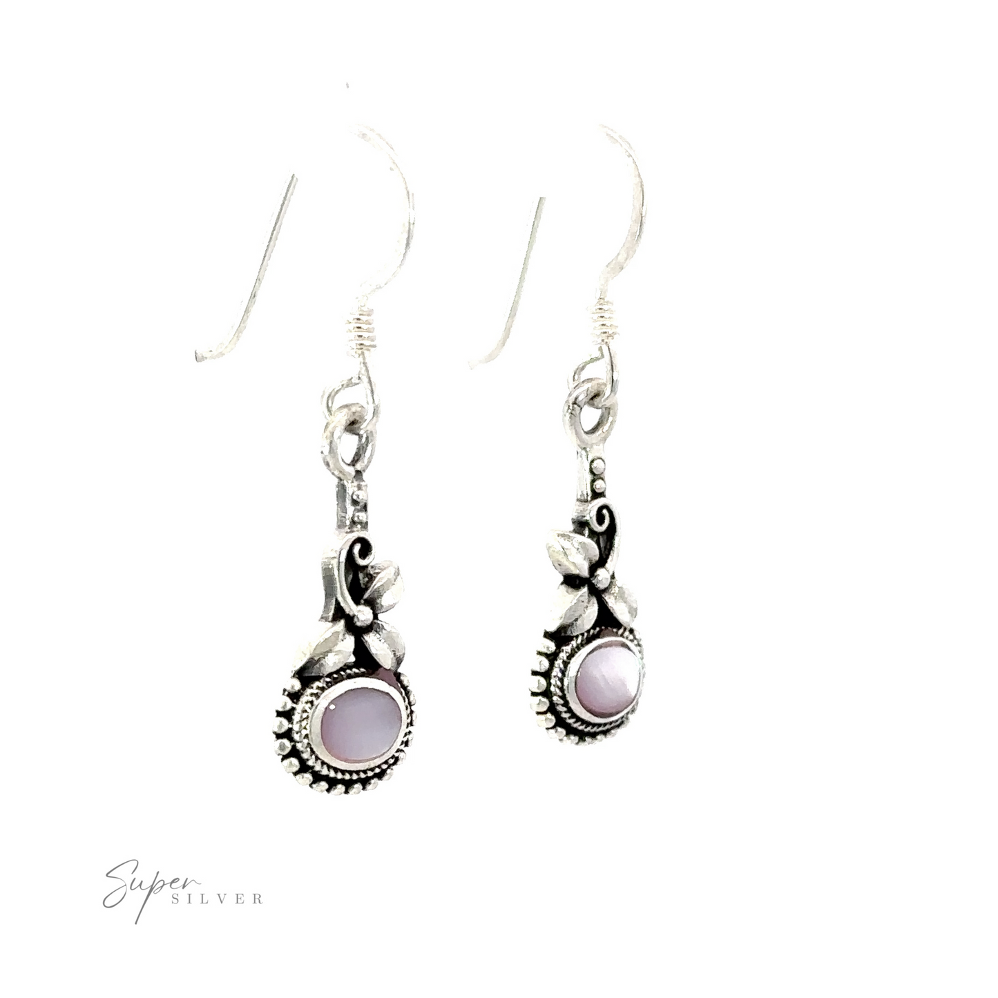 
                  
                    A pair of Inlaid Flower Earrings with Oval Stone with a vintage charm and white stone.
                  
                