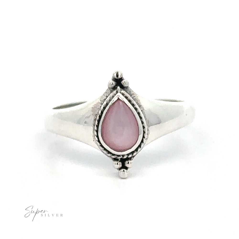 
                  
                    Sterling silver Teardrop Inlay Shield Ring with a pink gemstone set in a detailed mount.
                  
                