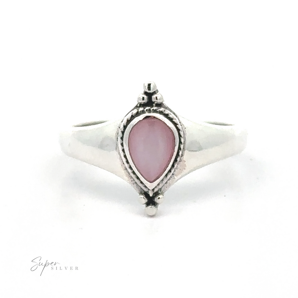 
                  
                    Sterling silver Teardrop Inlay Shield Ring with a pink gemstone centerpiece.
                  
                