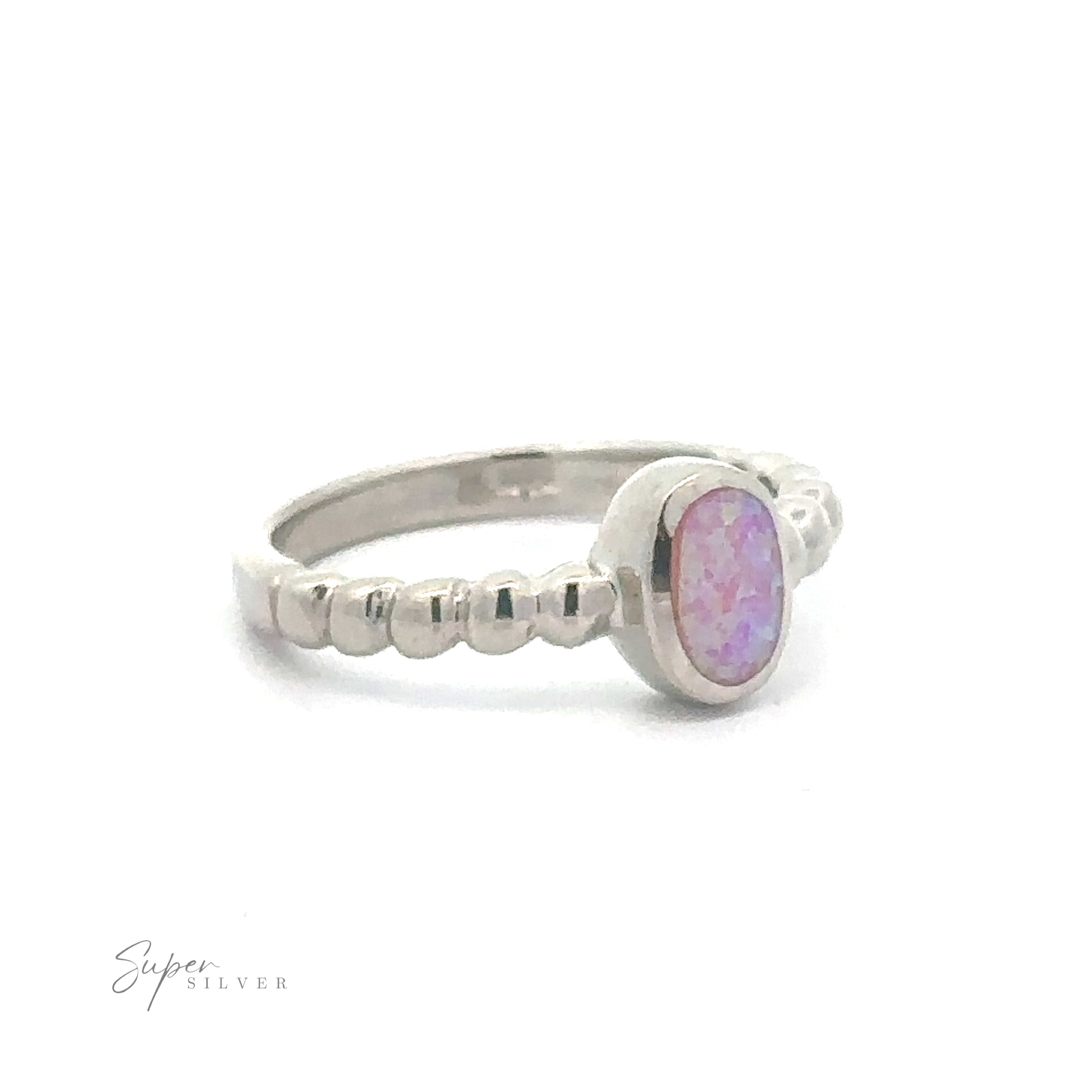 Silver ring with an Oval Lab Opal with Beaded Band stone set in a bezel setting, displayed on a white background.