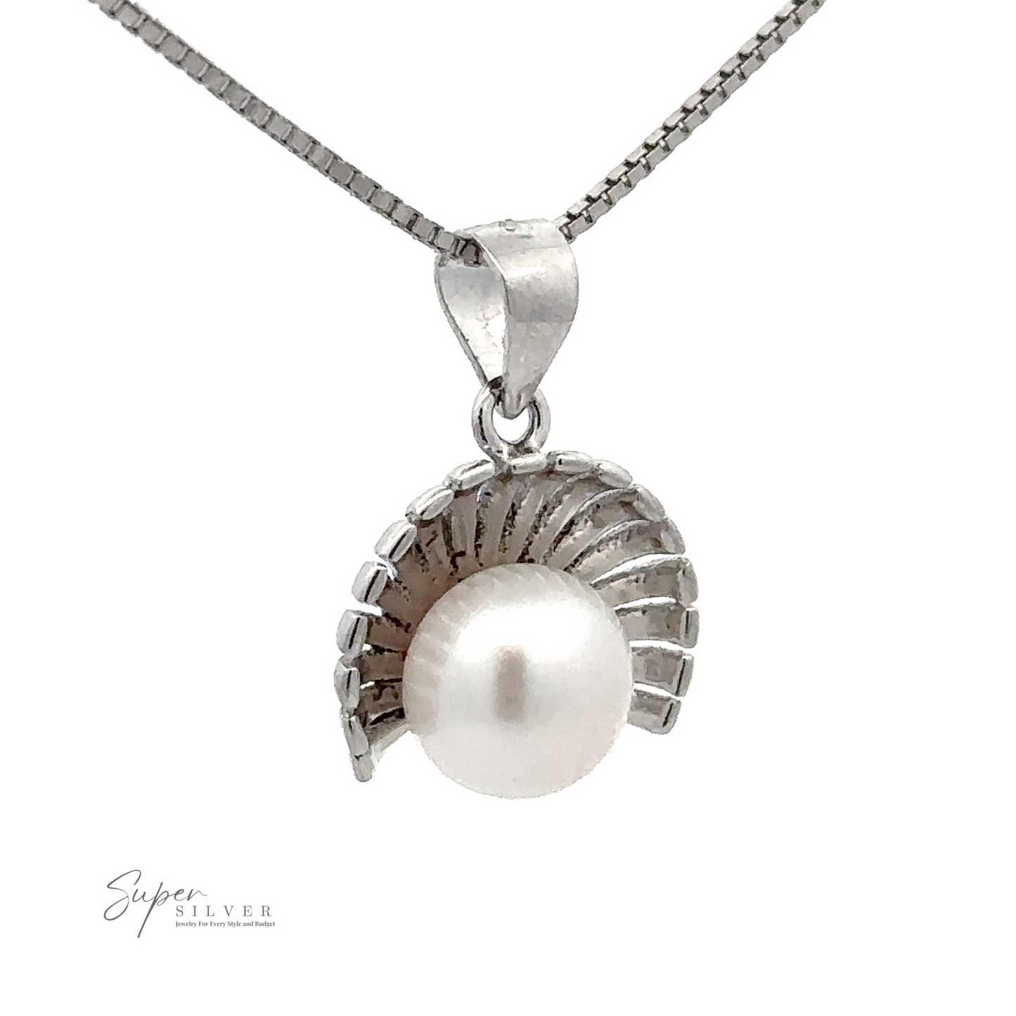 
                  
                    A Pearl Pendant with Shell Background encased in a petite half shell design with a box-style chain made from sterling silver. The logo "Super Silver" is visible in the lower left corner.
                  
                