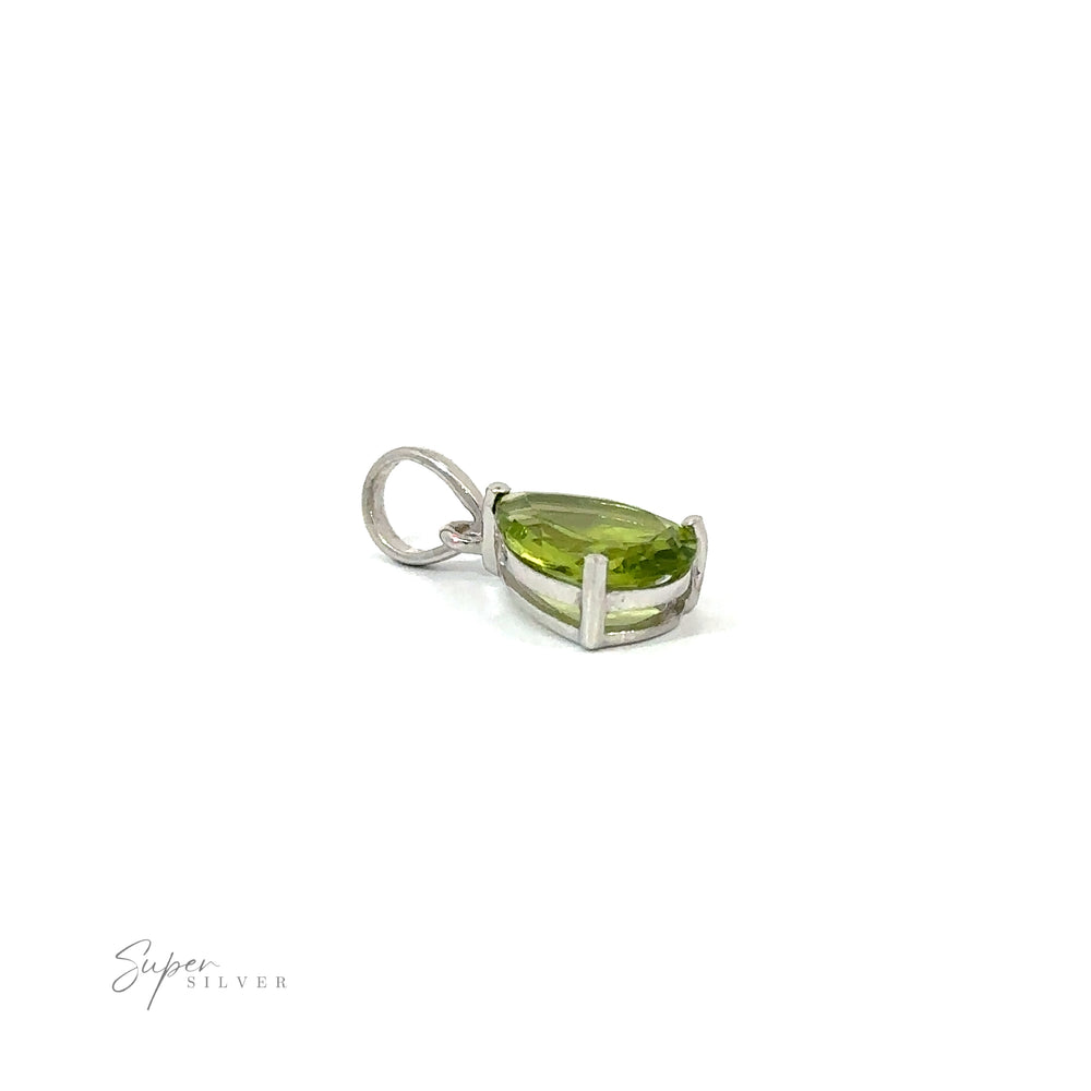 
                  
                    Dainty faceted peridot pendant in sterling silver with a minimalist style.
                  
                