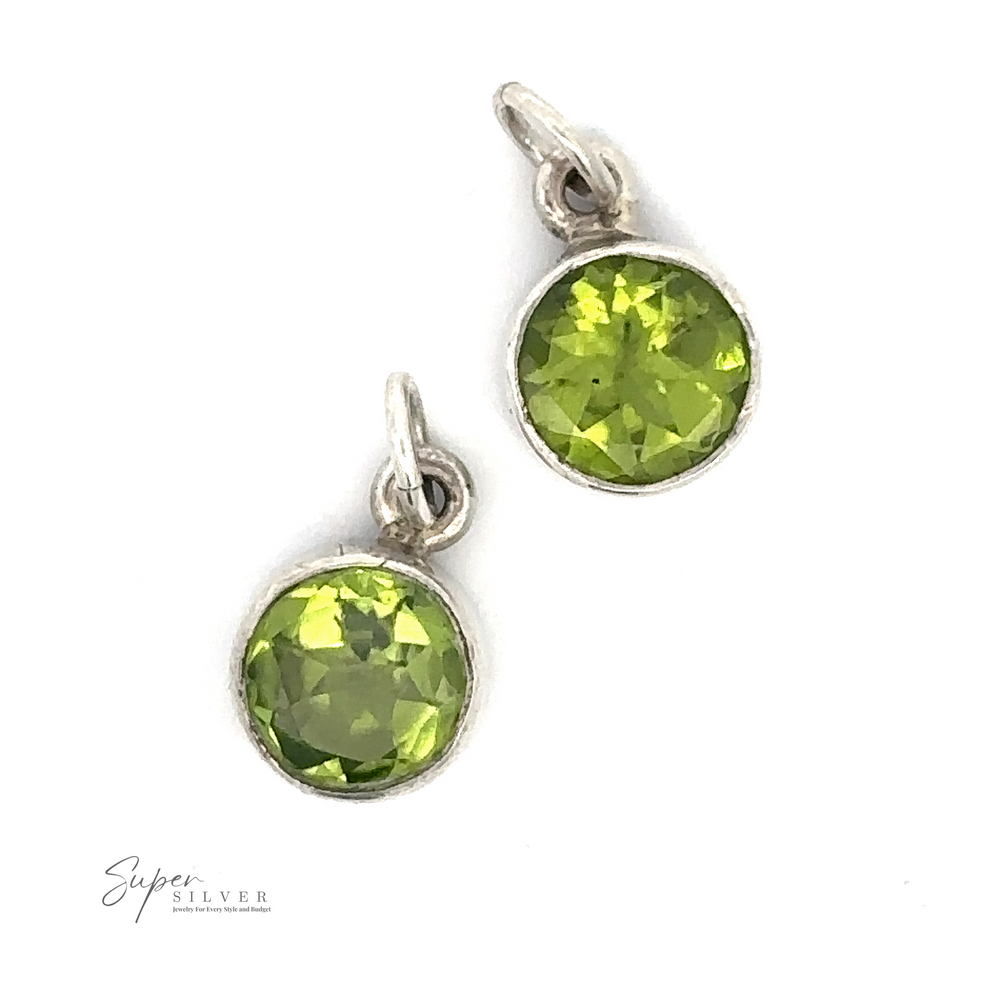 The Round Peridot Pendants, the birthstone for August, with green faceted gemstones set in round frames against a white background. Crafted from .925 Sterling Silver, the "Super Silver" logo appears in the bottom left corner.
