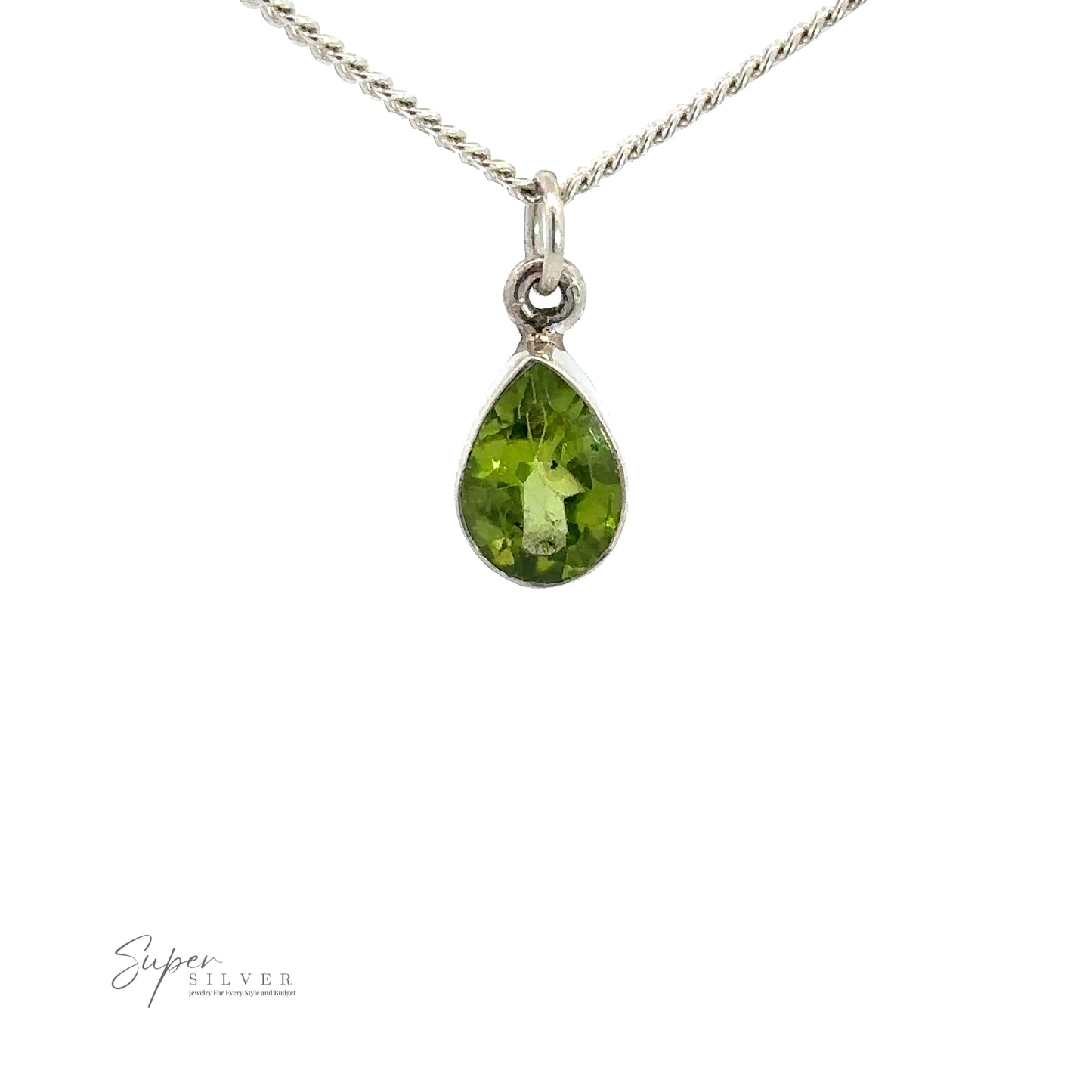 A Peridot Teardrop Pendant featuring a simple teardrop peridot with a green August birthstone in the center sits elegantly on a white background. The necklace boasts a thin, twisted chain.