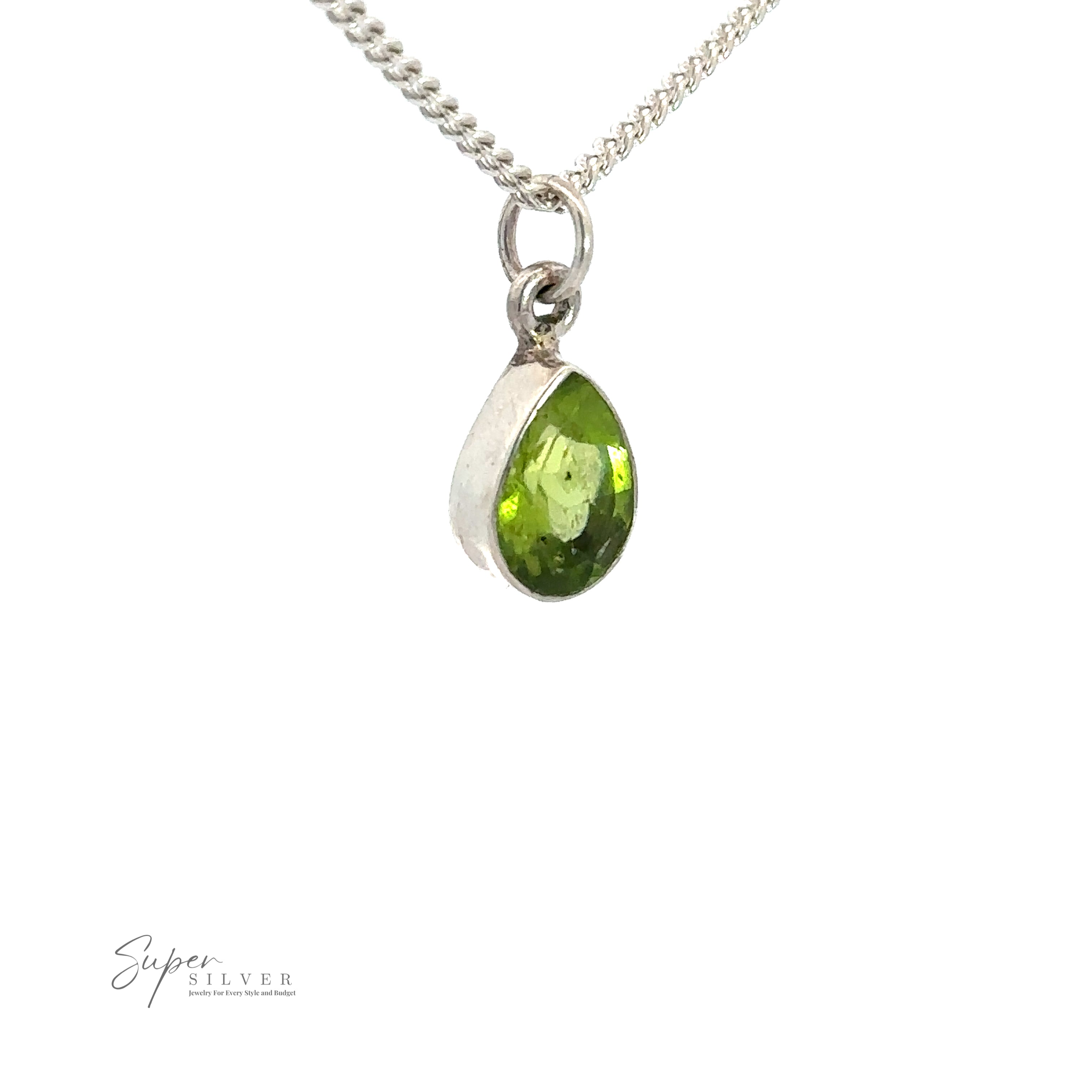 A sterling silver chain necklace featuring a simple Peridot Teardrop Pendant, perfect for those with an August birthstone. The image has a watermark in the bottom left corner reading "Super Silver.
