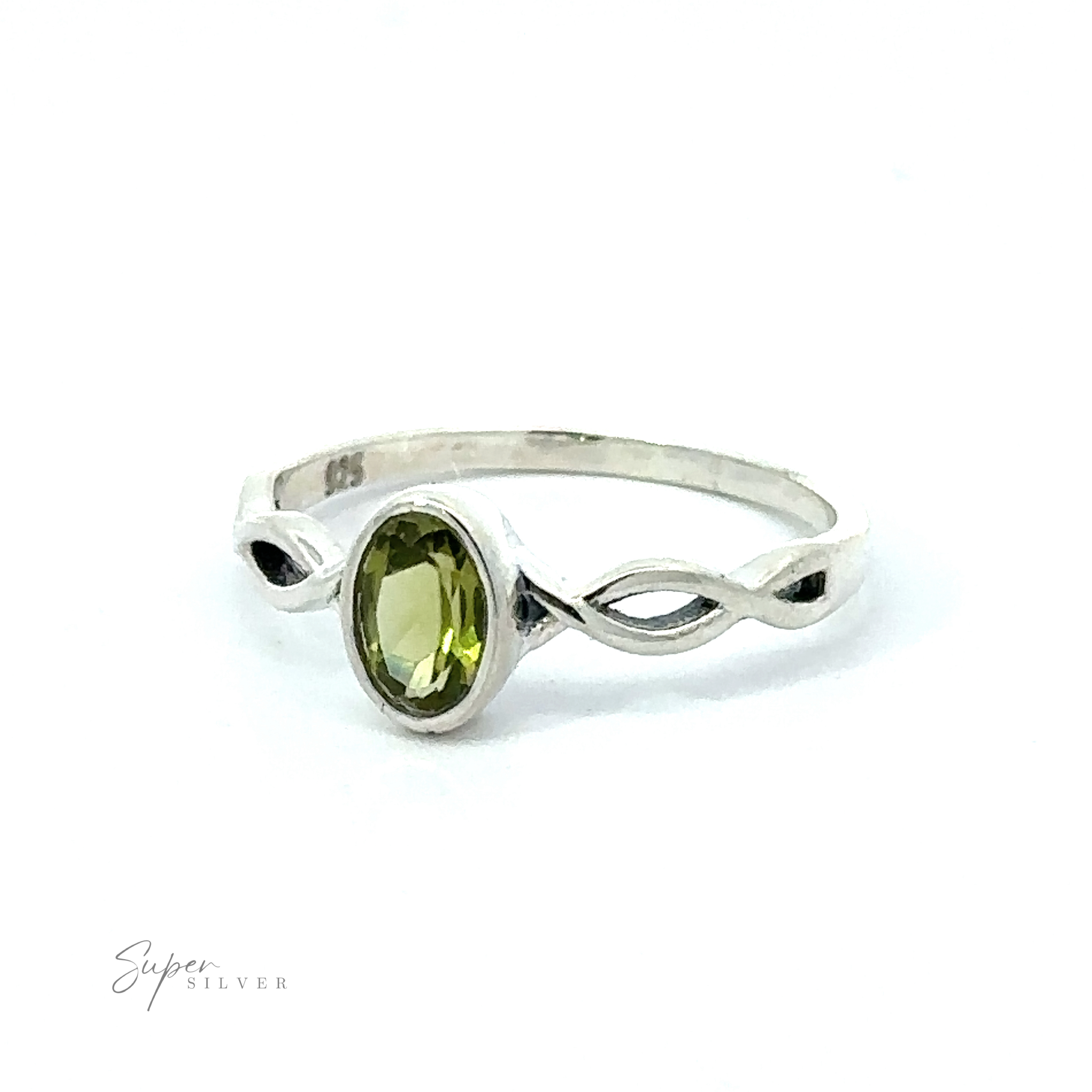 Dainty Oval Gemstone Ring with Twisted Band featuring a sparkling oval green gemstone set in a twisted band with an infinity symbol design, displayed against a white background.