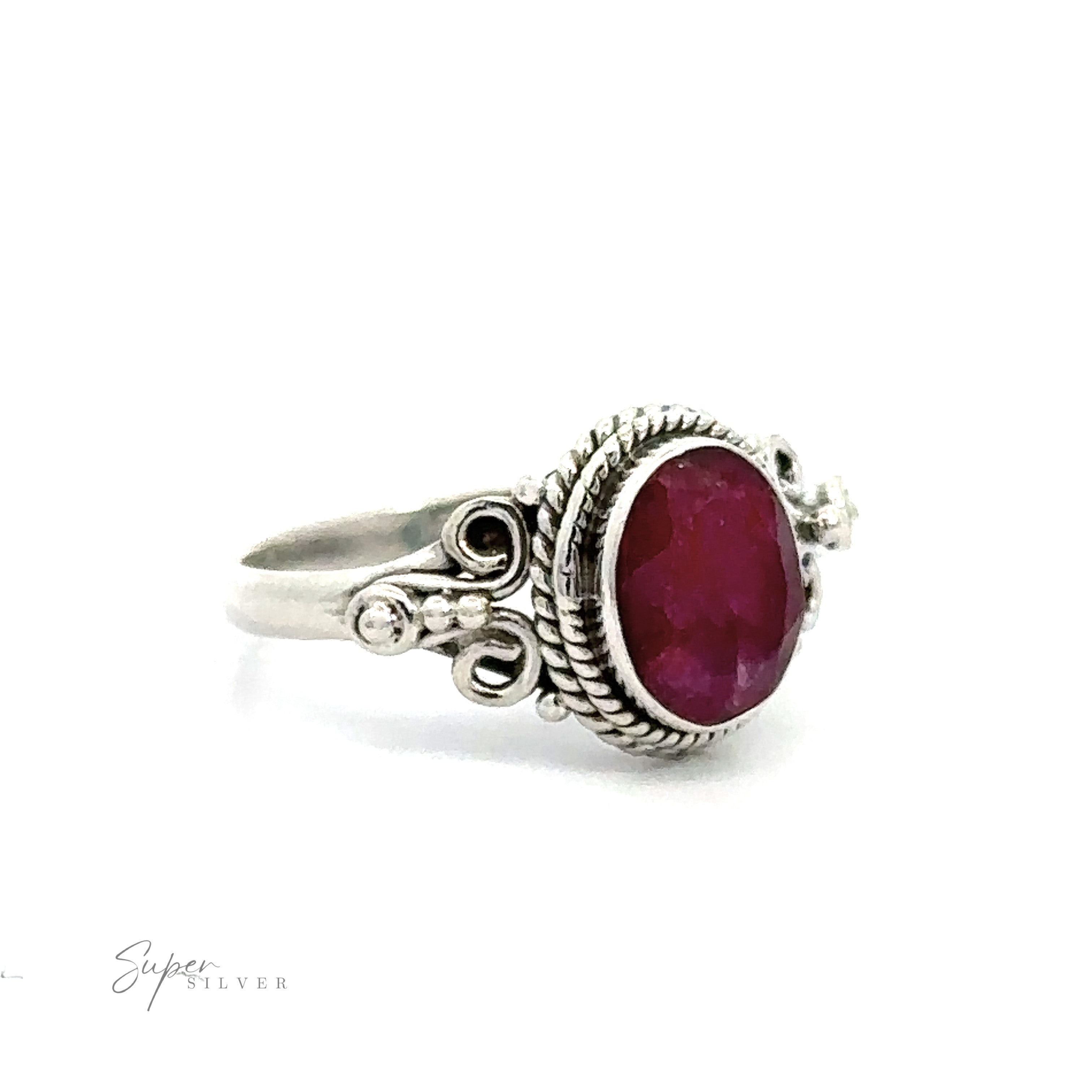 Natural Oval Gemstone Ring with Intricate Rope and Long Spiral Border with a vintage appeal in its ornate design.