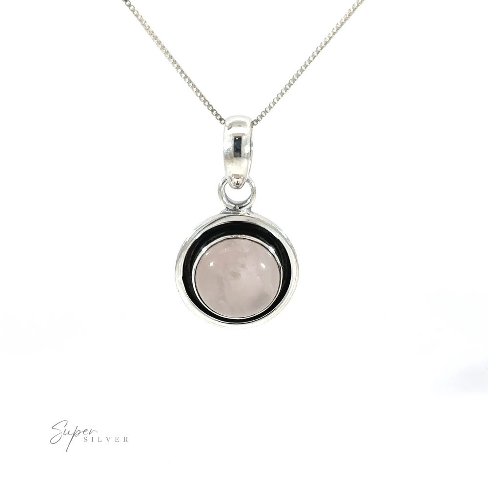 
                  
                    A Minimalist Round Gemstone pendant with an oxidized edge.
                  
                