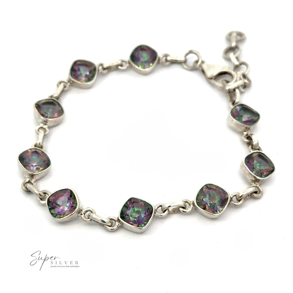 
                  
                    A Rainbow Mystic Topaz Diamond Link Bracelet featuring nine multicolored gemstone links set in square frames. The bracelet, with a lobster clasp, includes a dazzling Mystic Topaz and is part of the "Super Silver" collection. The logo is placed at the bottom left of the image.
                  
                
