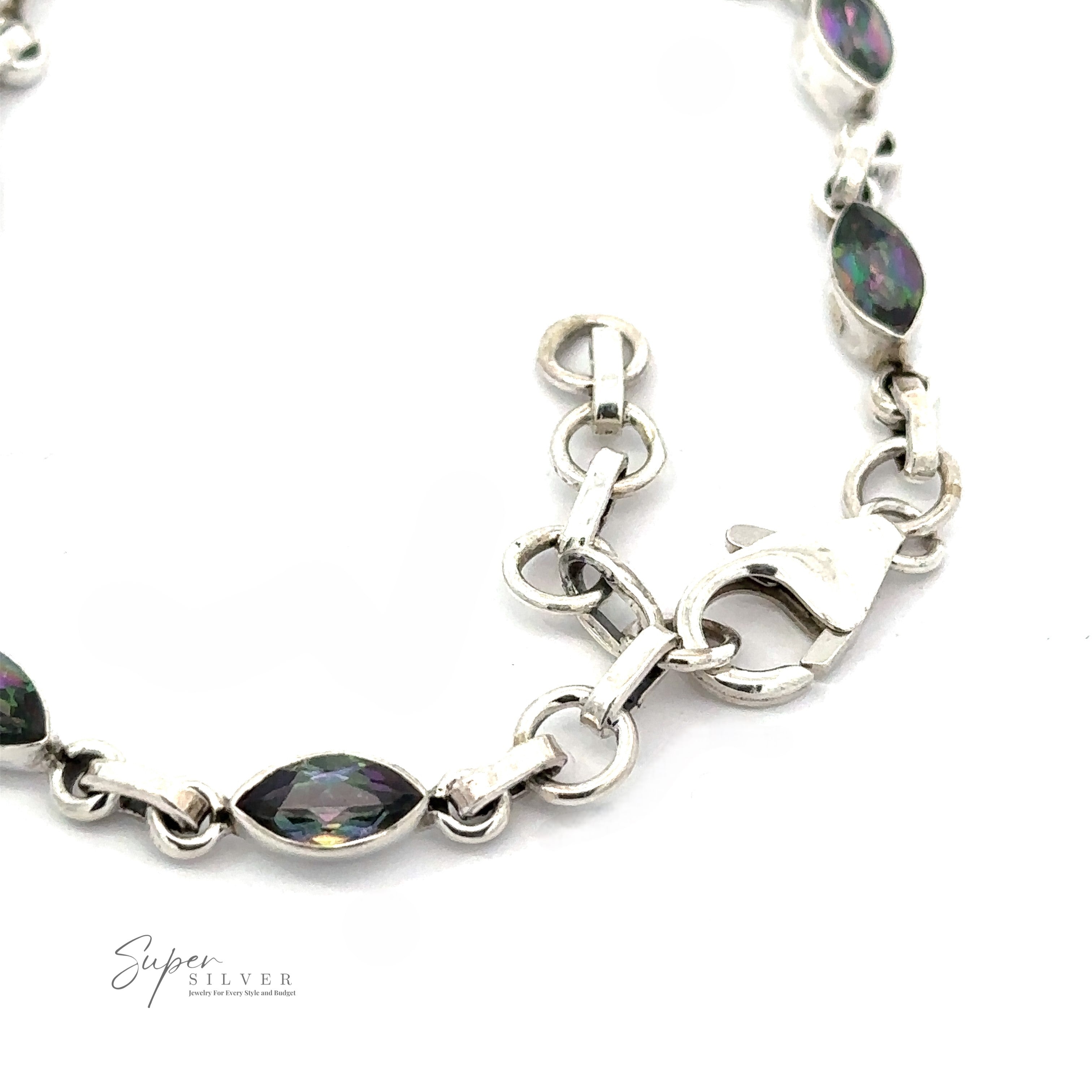 Close-up image of a sterling silver bracelet with oval-shaped multicolored gemstones and a lobster claw clasp. The text "Super Silver" is visible in the bottom left corner. This exquisite piece, accented with Rainbow Mystic Topaz Marquise Link Bracelet, shines brightly for any occasion.