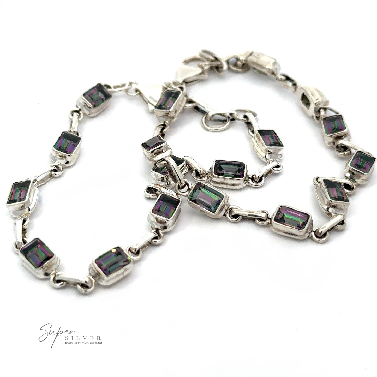 
                  
                    A Rainbow Mystic Topaz Rectangle Link Bracelet adorned with purple stones.
                  
                