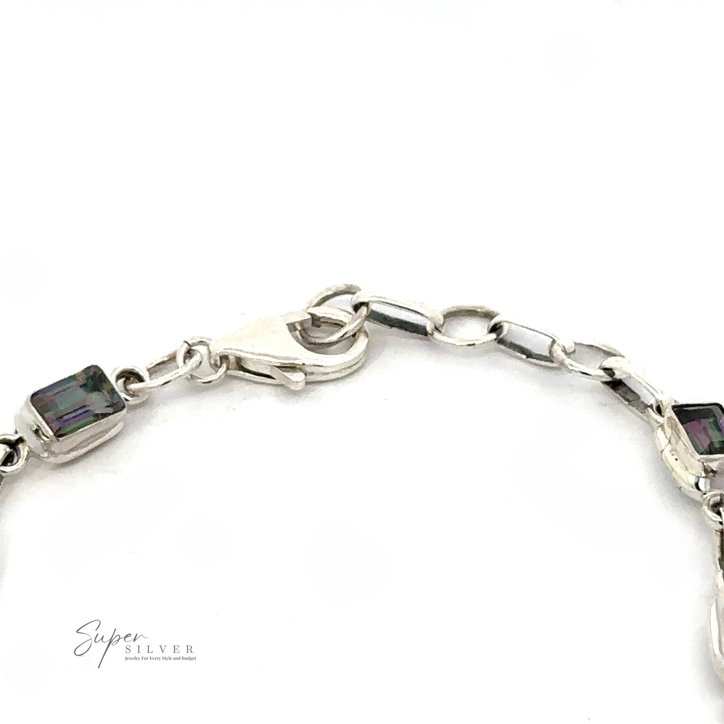 
                  
                    A close-up image of a Rainbow Mystic Topaz Rectangle Link Bracelet featuring a clasp and rectangular gemstones. The image includes the "Super Silver" logo in the bottom left corner.
                  
                