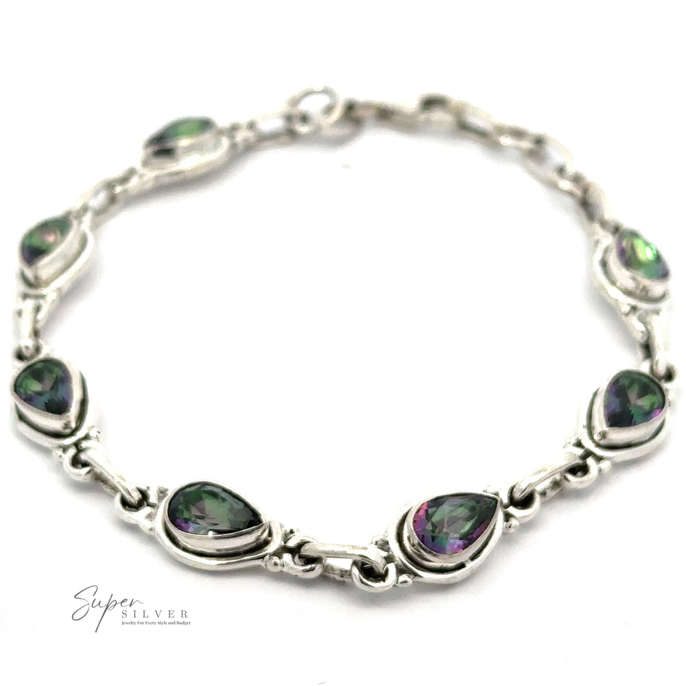 
                  
                    A Rainbow Topaz Bordered Teardrop Bracelet with teardrop-shaped multicolored gemstones. The bracelet features a chain link design connecting each gemstone. The logo "Super Silver" is visible in the bottom left corner.
                  
                