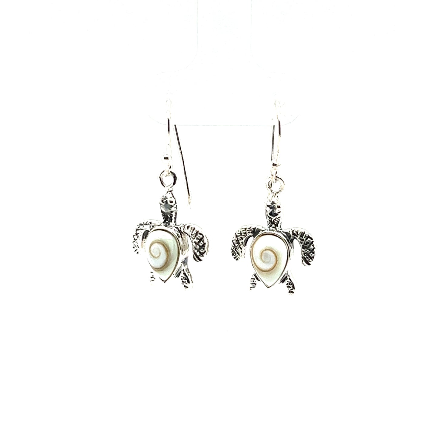A pair of Super Silver Sea Turtle earrings with Shiva Shell adornments.