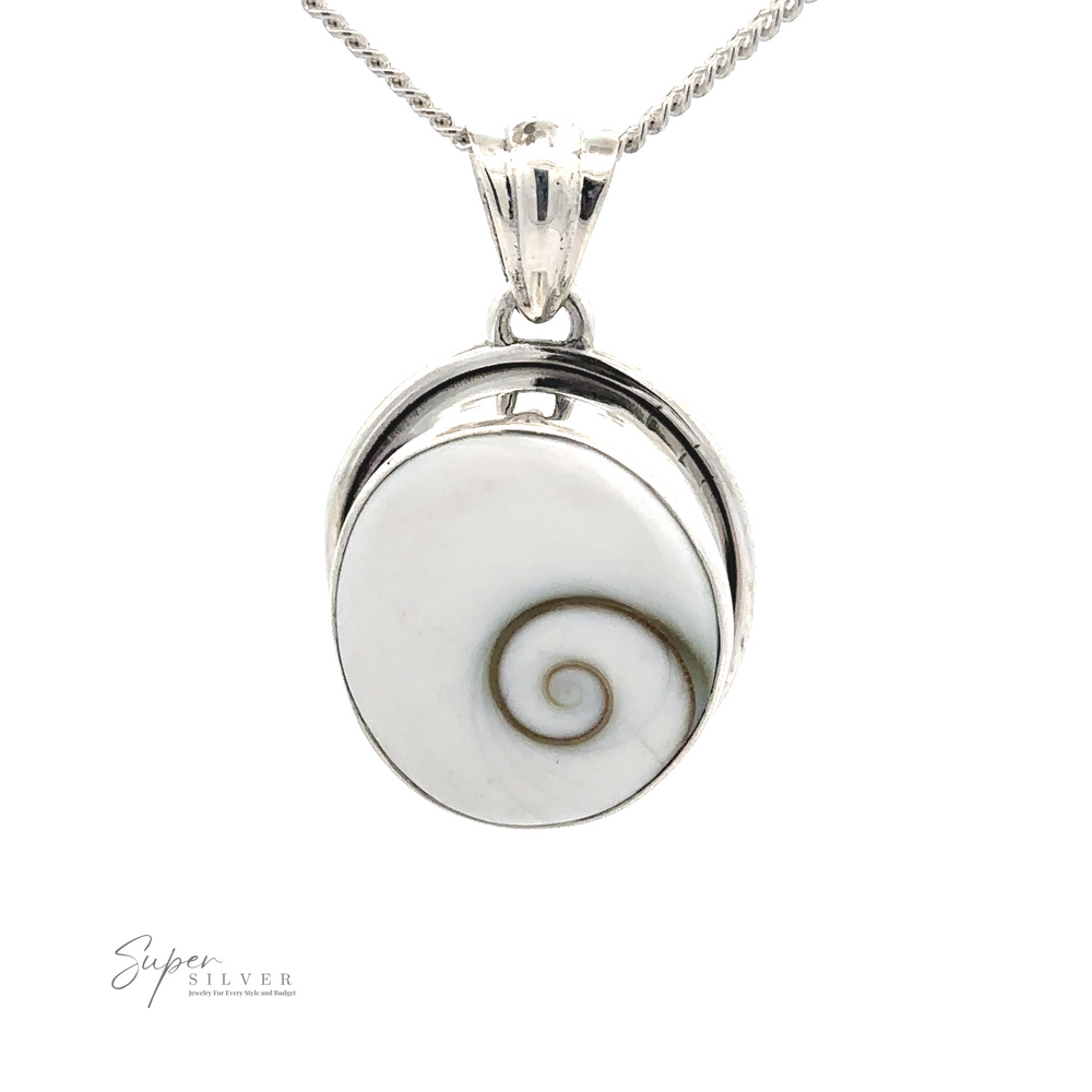 
                  
                    A silver necklace with a pendant featuring a spiral design on a white background. Perfect for any ocean lover, this Shiva Shell Pendant is beautifully complemented by a twisted chain. The oval-shaped pendant adds to its bohemian jewelry charm, with "Super Silver" visible in the lower left corner.
                  
                