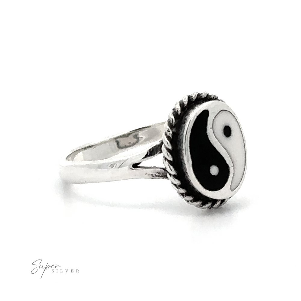 An interconnectedness Yin-Yang Ring with Rope Border that embodies eternal balance with its black and white symbol.