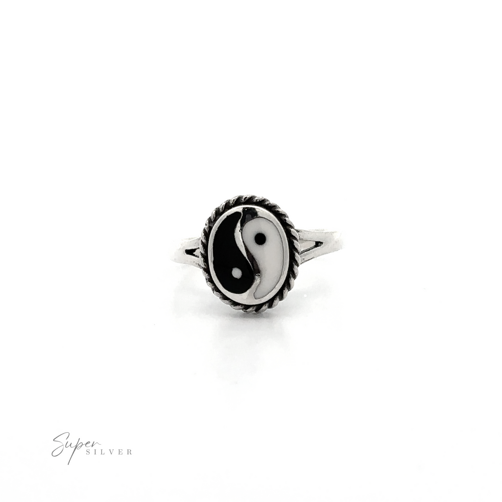 
                  
                    A black and white Yin-Yang Ring with Rope Border representing harmony and balance on a white background.
                  
                