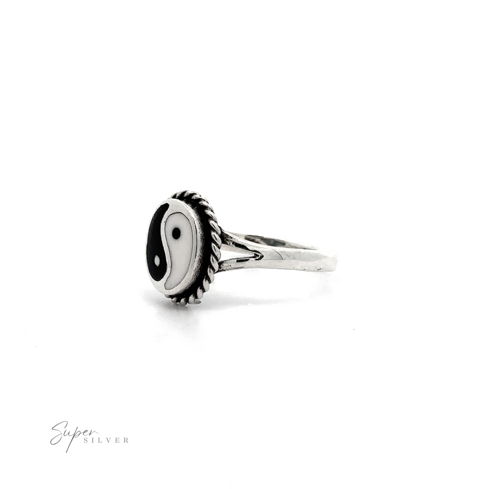 
                  
                    A black and white Yin-Yang Ring with Rope Border symbolizing balance and harmony on a white background.
                  
                
