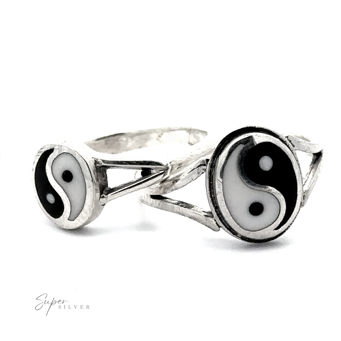 
                  
                    Two Simple Inlaid Yin-Yang Rings crafted from Sterling Silver, displaying yin-yang symbols on white backgrounds. The rings feature contrasting black and white halves with alternating dots, symbolizing balance.
                  
                