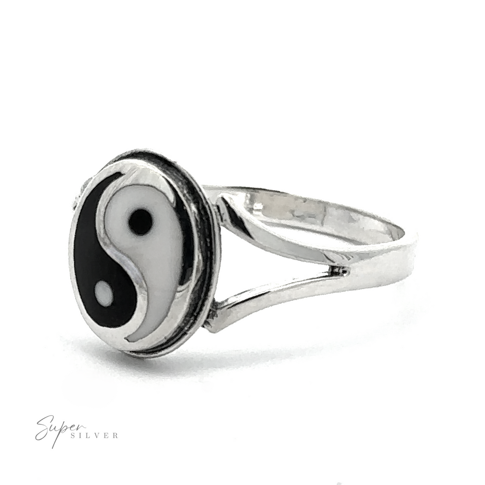 
                  
                    The Simple Inlaid Yin-Yang Ring is a sterling silver piece with a minimalist design, featuring a narrow band and an oval-shaped face adorned with a black and white yin-yang symbol, making it perfect for those who appreciate understated elegance.
                  
                