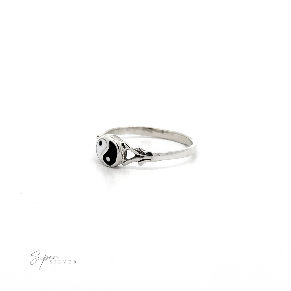 
                  
                    A silver ring with a Delicate Yin Yang Ring symbol.
                  
                
