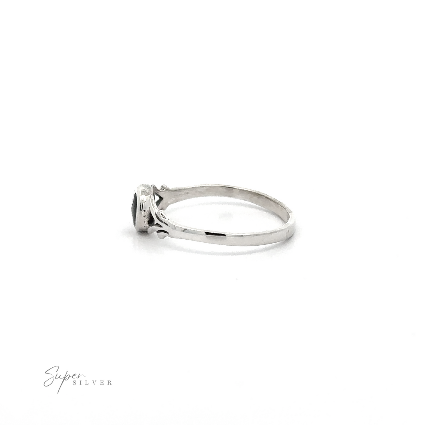 
                  
                    A delicate Yin Yang Ring with a yin-yang circle stone on a white background.
                  
                