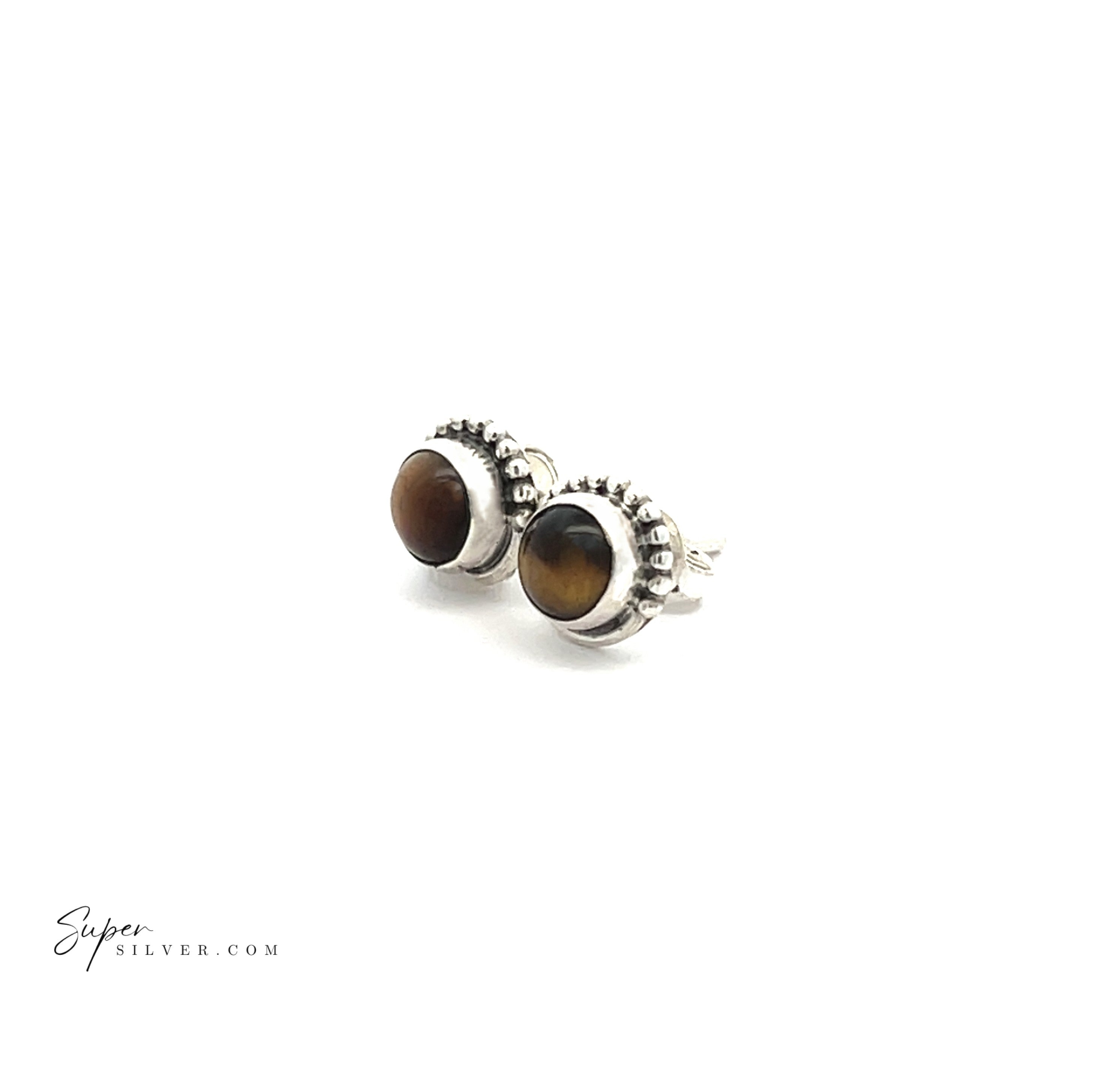 The 5mm Gemstone Studs With Half Bead Design are sterling silver stud earrings with round brown tiger’s eye stones in a bezel setting, shown on a white background.