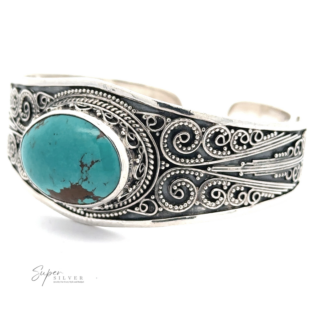 Genuine Turquoise Bali Cuff Bracelet featuring intricate scrollwork details and a large oval genuine turquoise stone in the center. The brand name "Super Silver" is visible in the bottom left corner. This elegant piece, reminiscent of a Bali cuff bracelet, is crafted from .925 Sterling Silver.