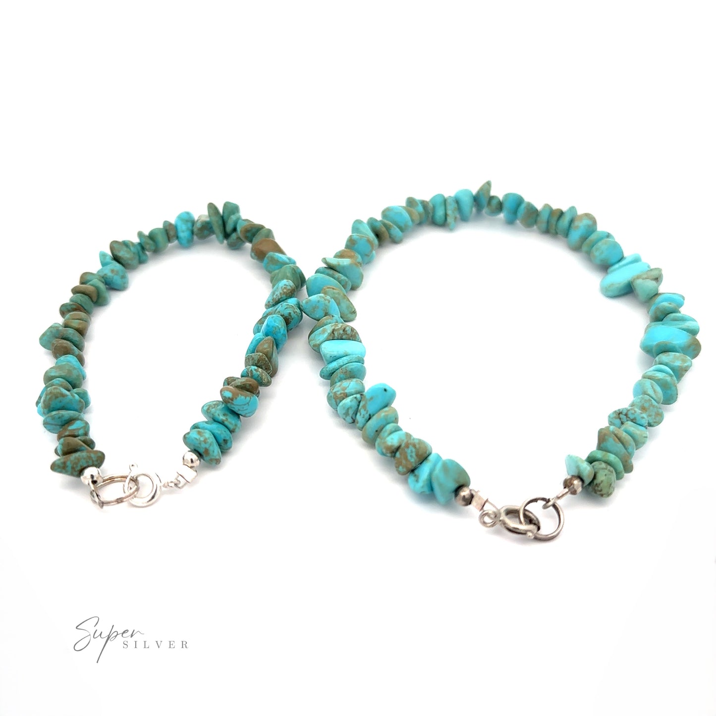 
                  
                    Two Southwest Colorado Turquoise Chip Bracelets or Anklets with .925 Sterling Silver clasps are displayed on a white background. Composed of irregularly shaped turquoise beads, they exude a southwest charm that complements any style.
                  
                
