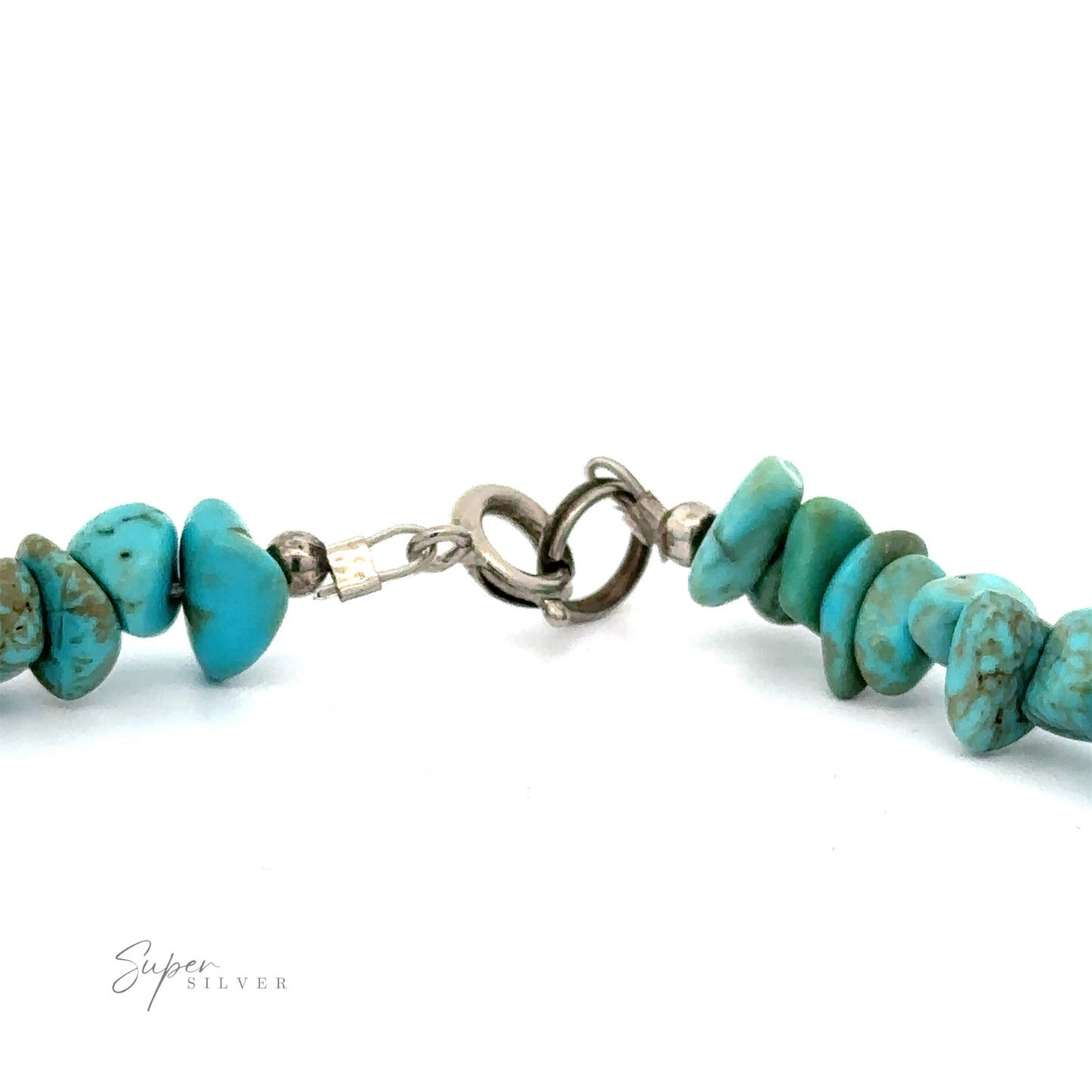 
                  
                    A Southwest Colorado Turquoise Chip Bracelet or Anklet clasp connects a string of irregular turquoise beads, evoking southwest charm against a white background. The partial logo "Super Silver" in the lower left corner hints at its .925 Sterling Silver quality.
                  
                