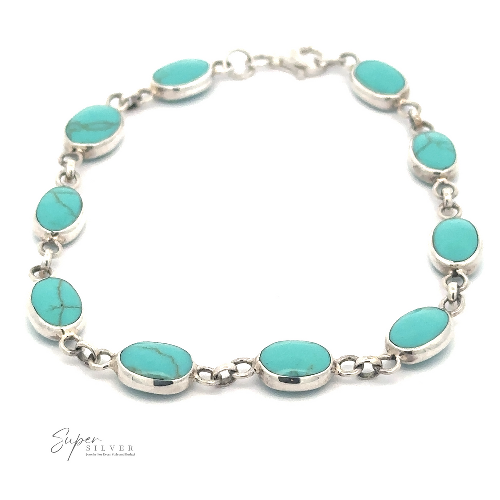 
                  
                    Photo of an Oval Turquoise Bracelet featuring ten oval turquoise stones linked together. The brand name "Super Silver" is in the bottom left corner.
                  
                