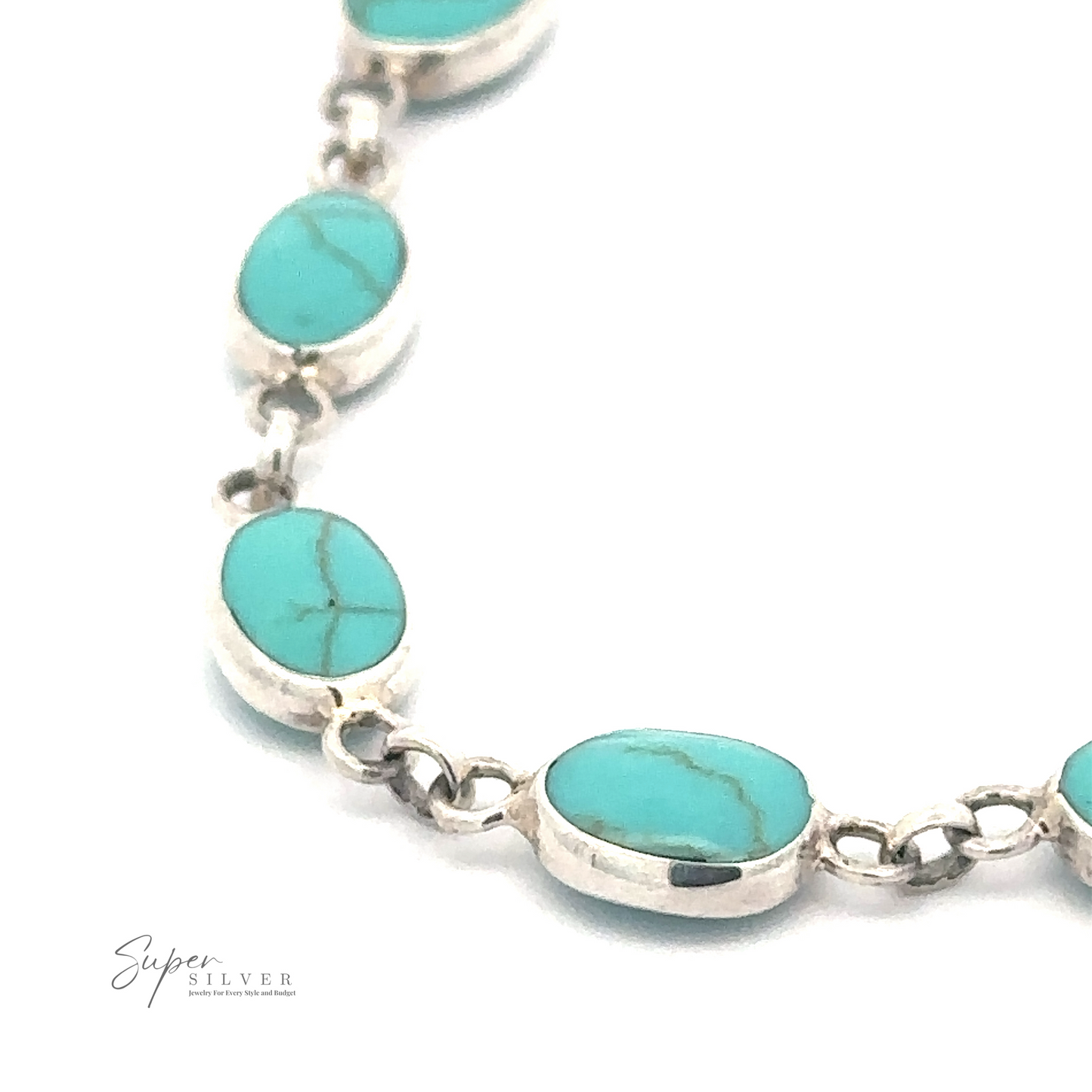 
                  
                    A sterling silver Oval Turquoise Bracelet featuring oval turquoise stones linked together. The stones have natural veining and are set in silver bezels. The brand logo "Super Silver" is visible in the bottom left corner.
                  
                