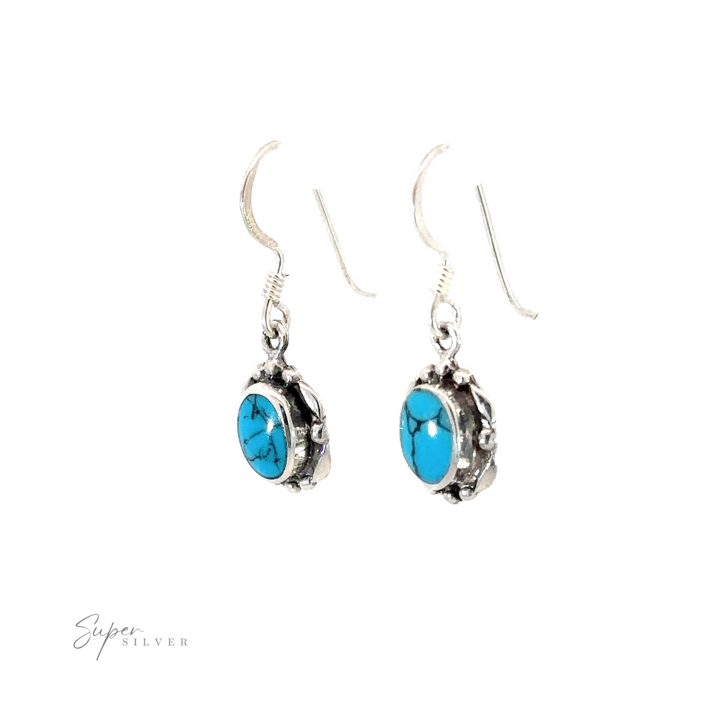 
                  
                    A stunning pair of Oval Inlaid Stone Earrings with turquoise stones elegantly inlaid.
                  
                