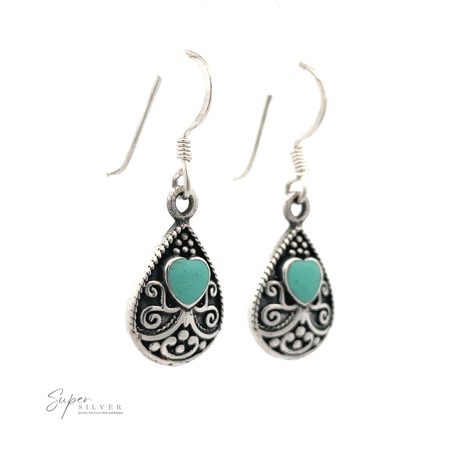 
                  
                    Pair of sterling silver hook earrings with intricate detailing and heart-shaped turquoise stones, reminiscent of Bali Style Teardrop Earrings with Inlaid Stone.
                  
                