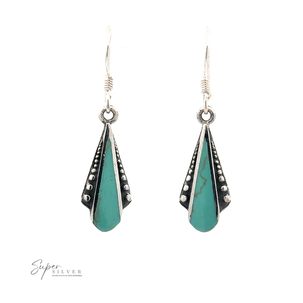 
                  
                    Inlaid Teardrop Shaped Bali Inspired Earrings featuring turquoise inlays with a teardrop shape, embellished with small silver beads along the sides. "Super Silver" logo in the bottom left corner, showcasing Bali inspired elegance.
                  
                