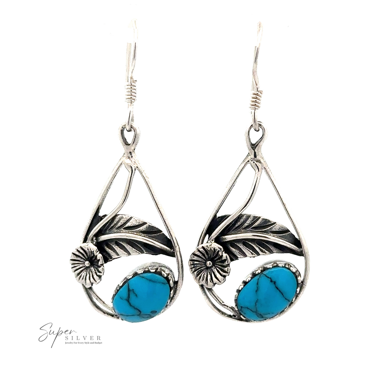 
                  
                    Inlaid Teardrop Earrings With Floral Setting, featuring blue turquoise stones. "Super Silver" branding visible in the bottom left corner.
                  
                