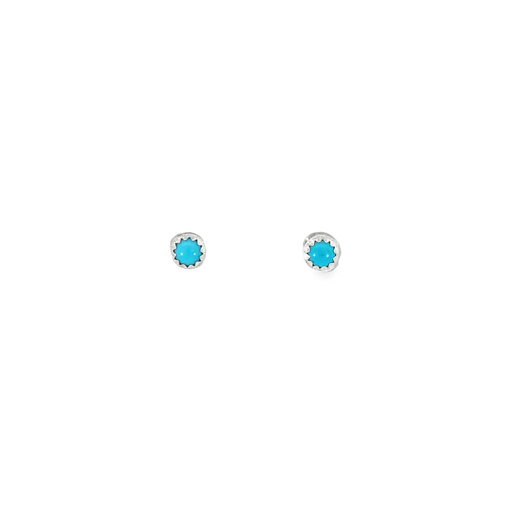 
                  
                    A pair of Circular Turquoise Studs on a white background.
                  
                