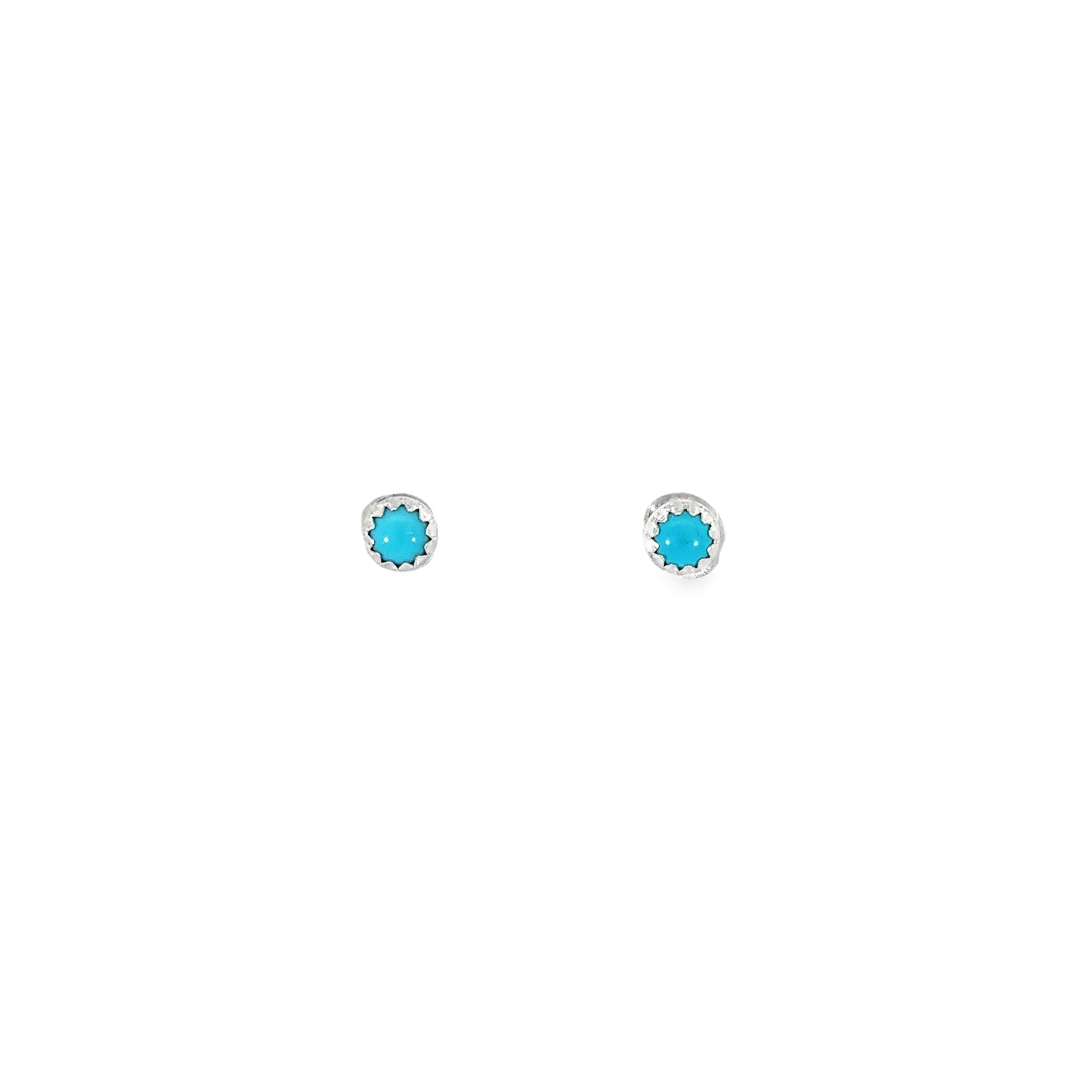 
                  
                    A pair of Circular Turquoise Studs on a white background.
                  
                