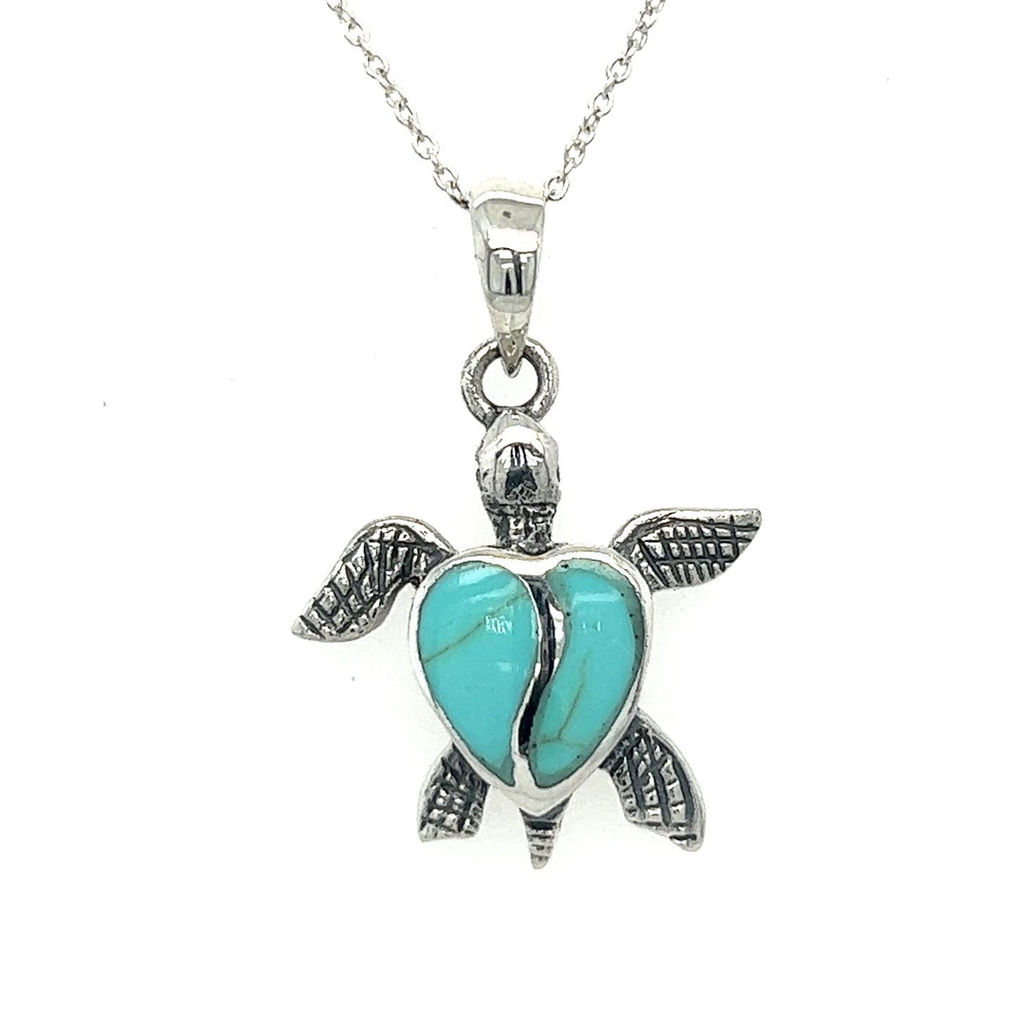 
                  
                    A Stone Inlay Turtle Pendant with turquoise stone on a silver chain.
                  
                