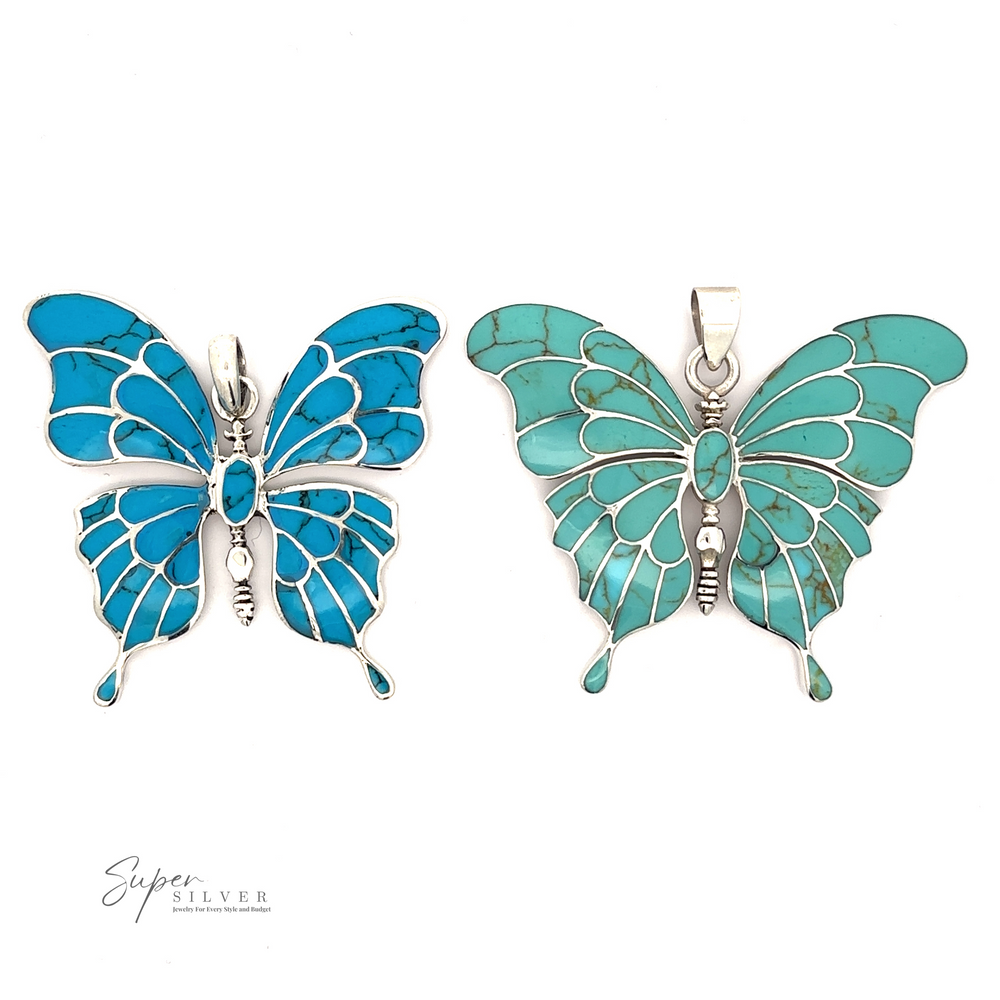 
                  
                    Two butterfly-shaped pendants with turquoise inlay and silver edges. The left butterfly pendant is blue and the right one is green. Both have detailed wing patterns and a bail at the top for attaching to a sterling silver necklace, making this Stunning Inlay Butterfly Pendant a stunning piece of turquoise jewelry.
                  
                