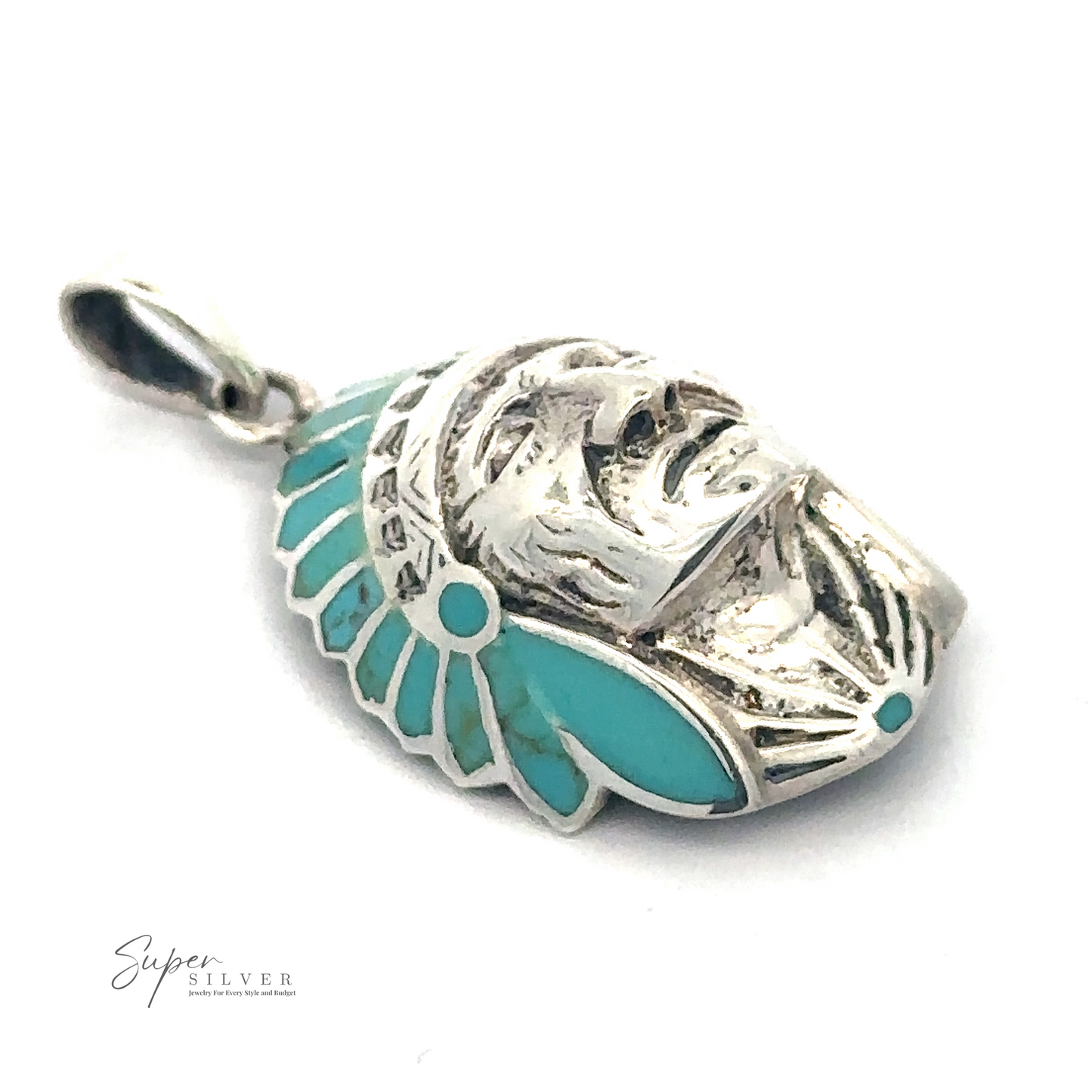 
                  
                    A Turquoise Chief Head Pendant shaped like a face with a turquoise headdress, placed on a white background. The words "Super Silver" appear in the lower-left corner.
                  
                