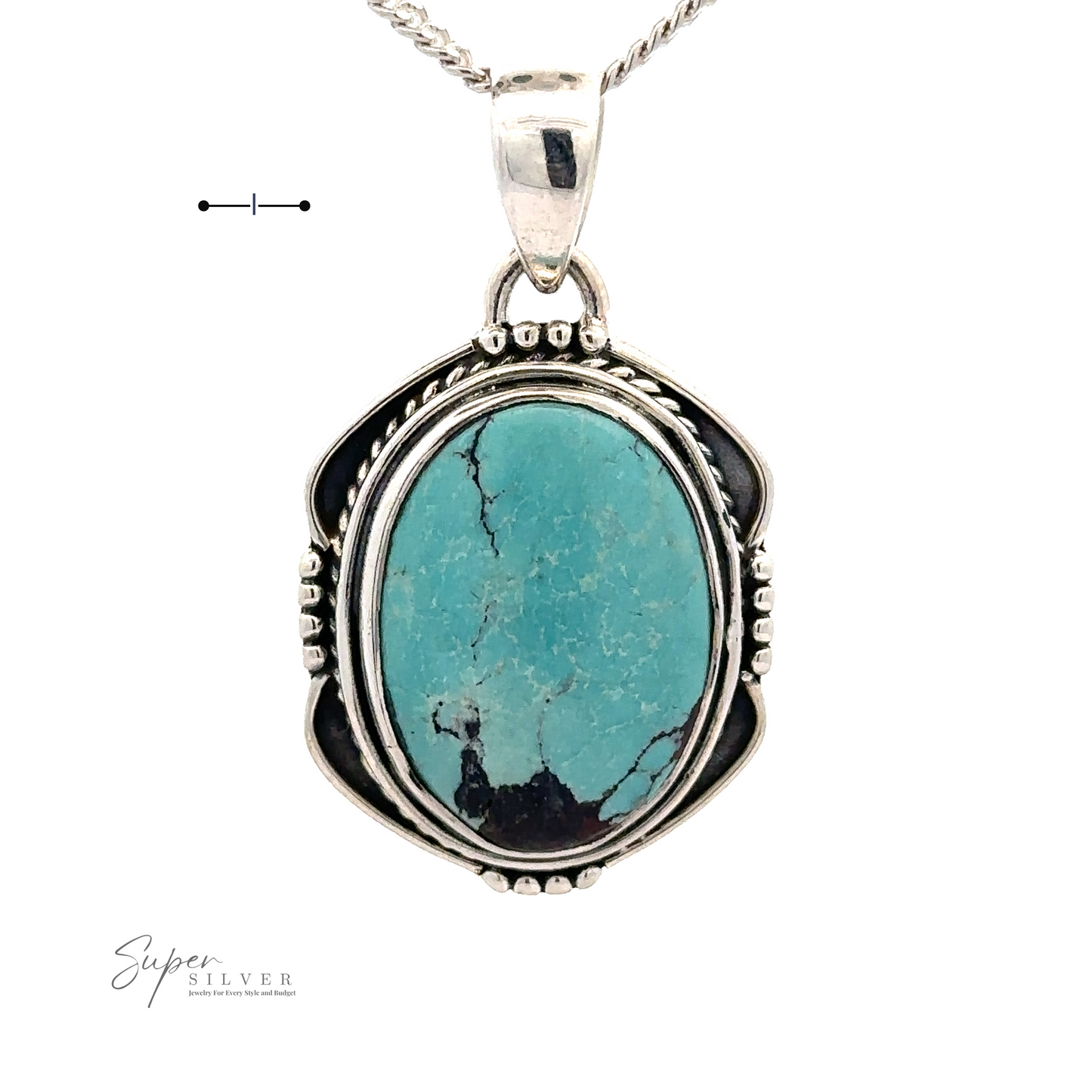 
                  
                    A Natural Turquoise Pendant with an Oval Shield Setting featuring an oval natural turquoise stone with black veining, showcased against a white background. The handmade piece boasts intricate silver detailing around the stone.
                  
                