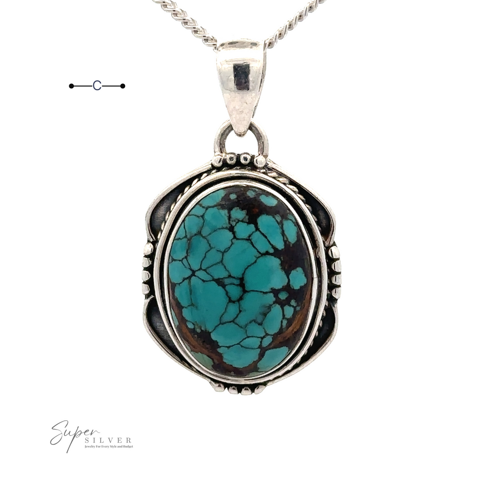 
                  
                    A Natural Turquoise Pendant with an Oval Shield Setting featuring a striking black veining pattern. The pendant is beautifully suspended from a twisted silver chain, making it a standout piece in any collection of handmade jewelry.
                  
                